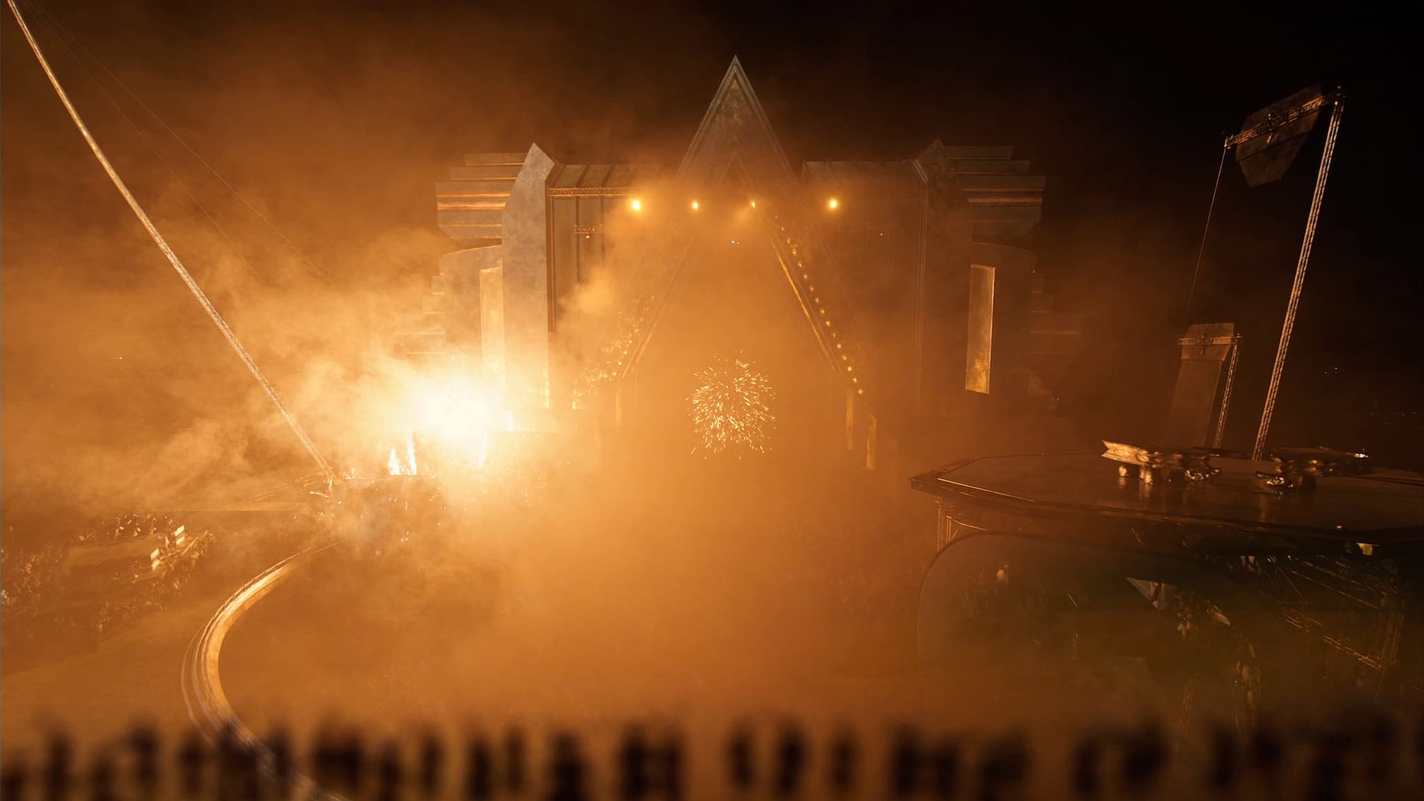A crowd gathered under warm festival lights